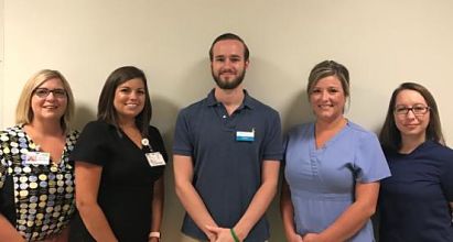 Pictured above:  Becky Rowell, RN, DON; Summer Williamson, LPN; Trey Gore, PT, DPT (RehabCare Program Director); Kimberly Rhodes, RN; and Tina Ayer, Admin Asst, CNAPicture of four females and one male Rehab staff members standing in the hospital hallway wearing scrubs.
